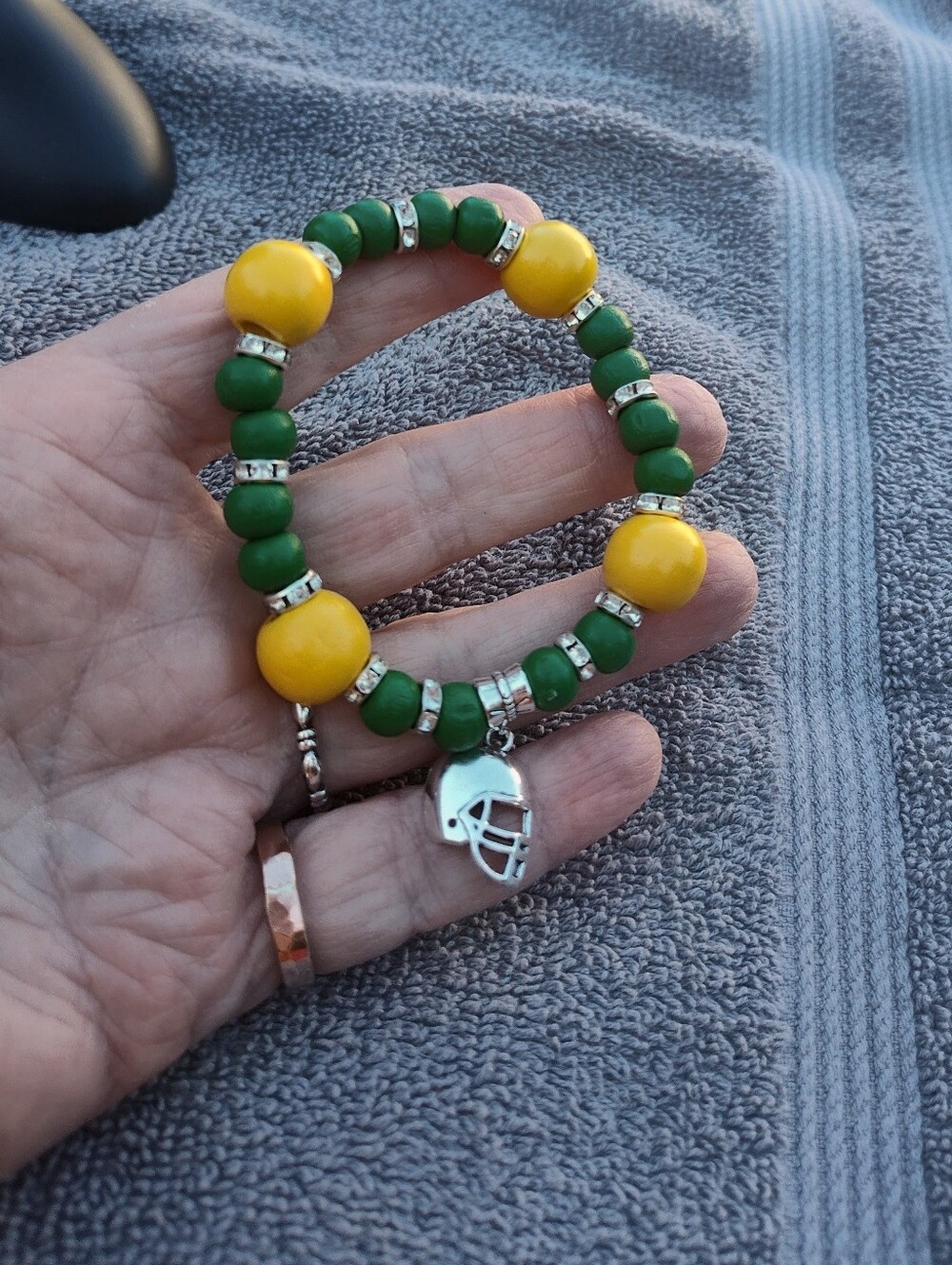 Green and Yellow Beaded Bracelet with Silver Accents Helmet Charm Handmade New